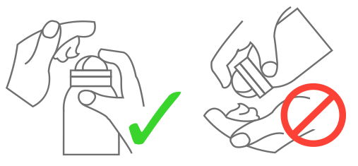 Shows the proper application of Neuropad Foot Foam, i.e. holding the canister upright