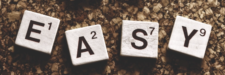 Scrabble letters spelling out the word EASY, to illustrate the proven ease of use of Neuropad 10-Minute screening test